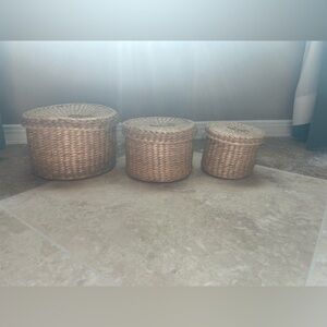 Vintage woven straw storage baskets